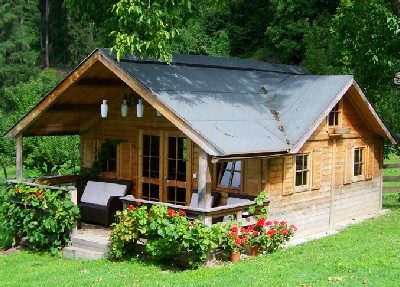 sustainable timber building surrounded by trees